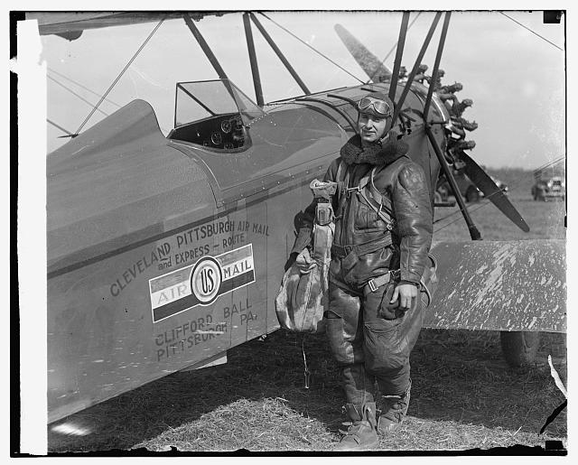 [Aviator standing with plane "Cleveland Pittsburgh Air...