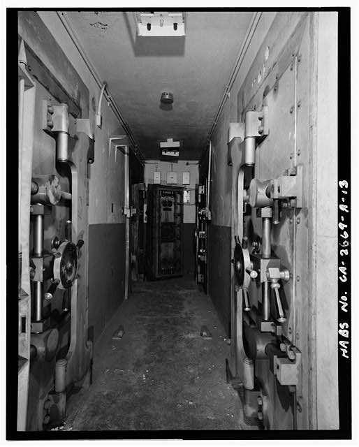 Hallway and bank vault-style doors from hallway entry....