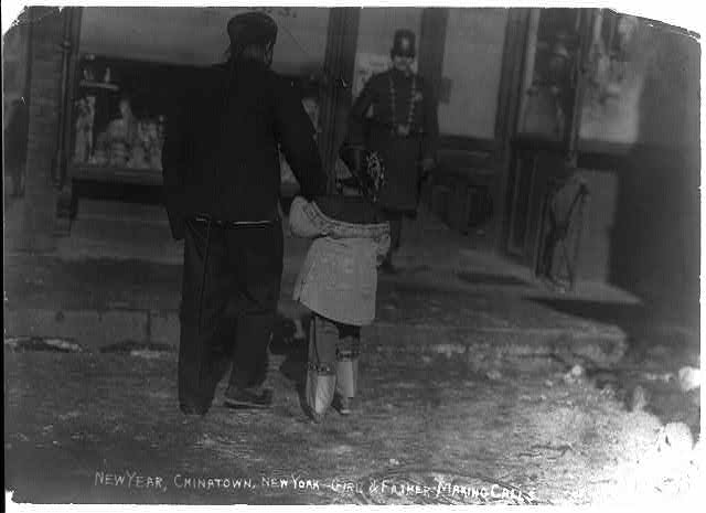 [Chinese-American father and daughter making New Year...