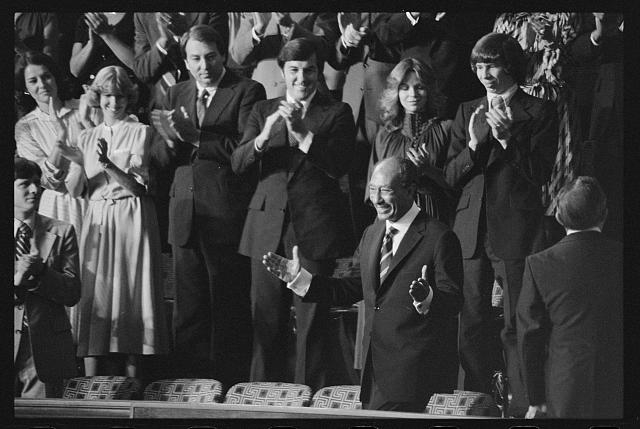 [Egyptian President Anwar Sadat acknowledges applause...