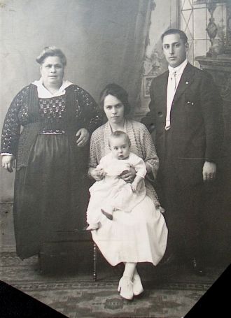 Mother,father,daughter, and baby