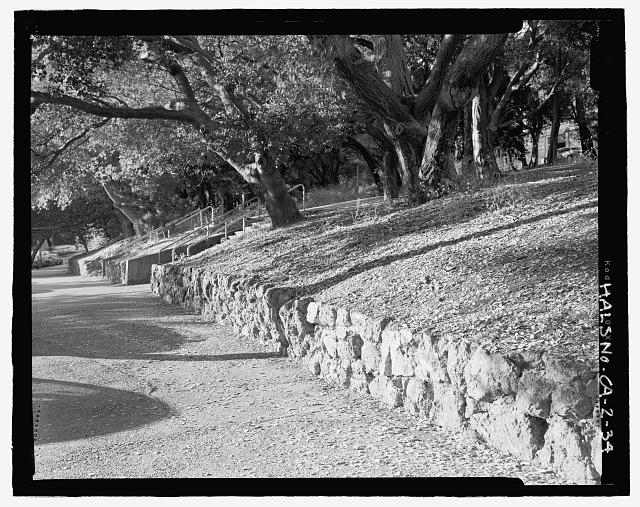 ALTERNATE VIEW OF SIDEWALK AND WALL OF INDIGENOUS...