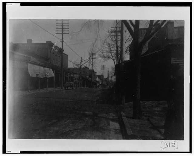 [Street scene showing buildings and power lines in Georgia]