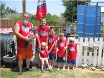 My brother and his 5 grandson's on the 4th of July 2010 and his lil dog gg
