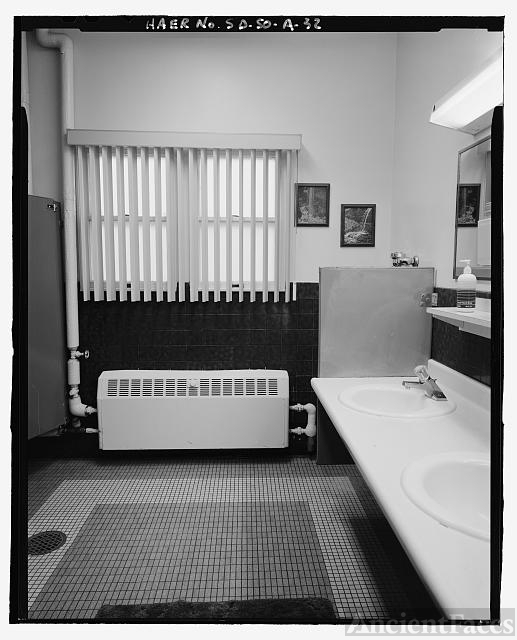 32. Men's latrine, looking south - Ellsworth Air Force...