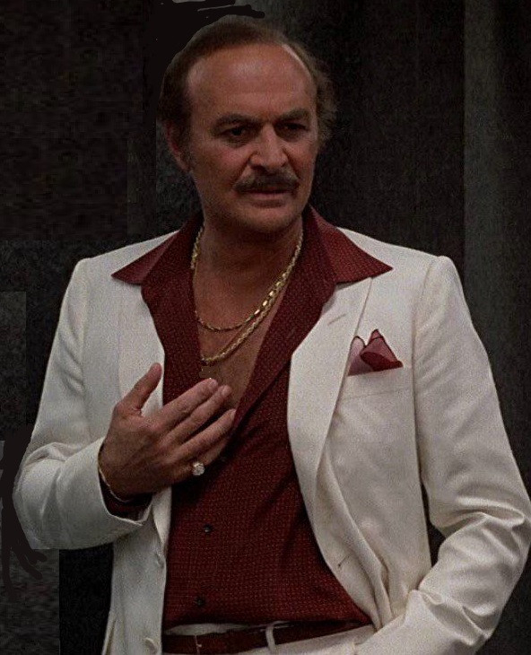 Robert Loggia in jewelry.