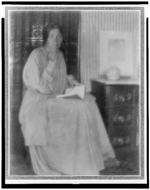 [Woman (Beatrice Baxter Ruyl), in dress with open book in...