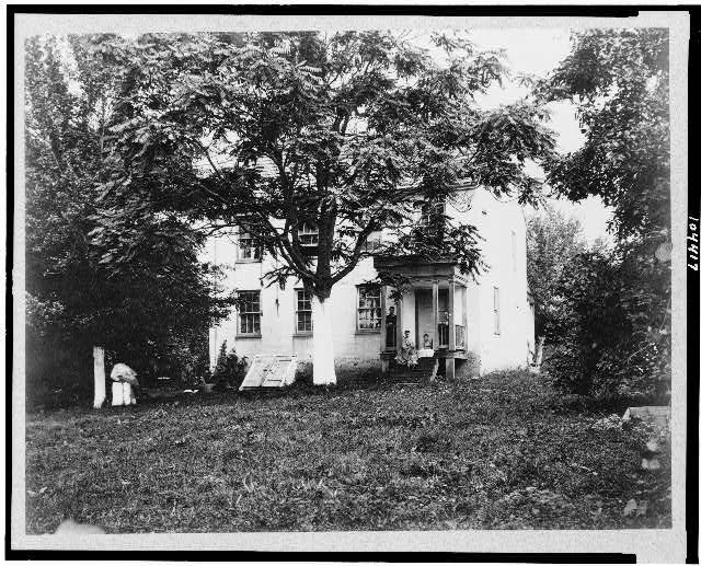 [D.R. Miller house, with family on porch, Hagerstown...