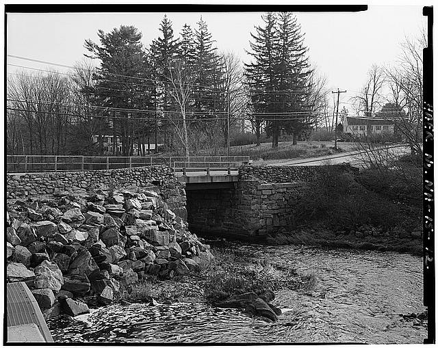 12. VIEW OF RIP-RAP ON WEST ELEVATION, LOOKING SOUTHEAST...