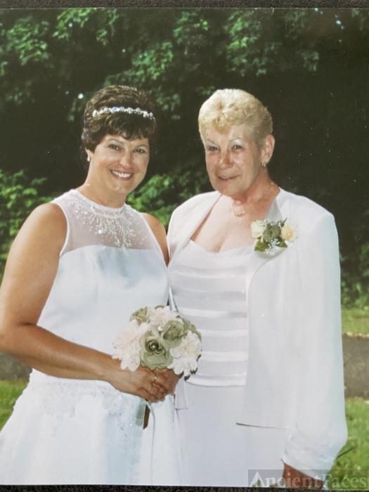Helen L Collins