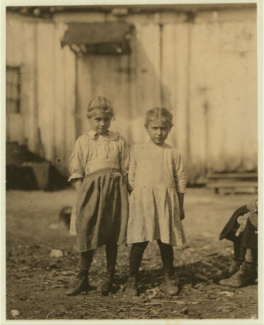 Rosie, (on the left) regular oyster shucker. A smaller...