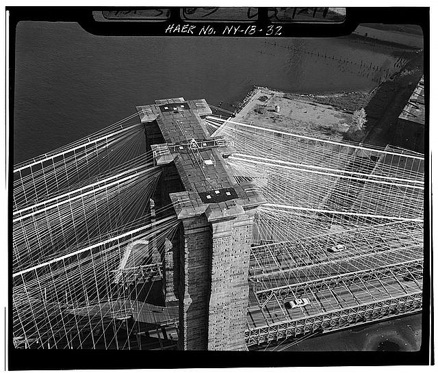 32. Aerial view looking E at top of Brooklyn Tower. Jet...