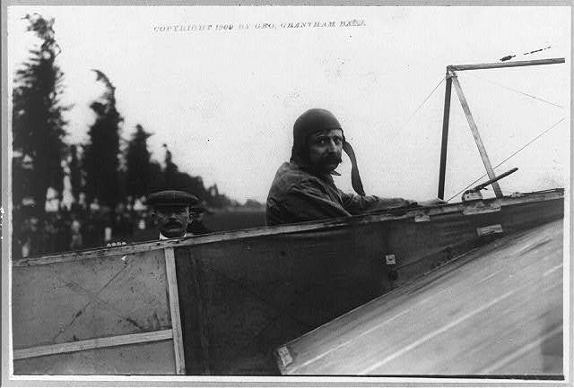 [Louis Blériot at the wheel of his monoplane, with...