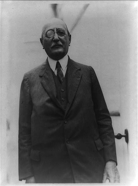 [Cass Gilbert, half-length portrait, standing, facing front]