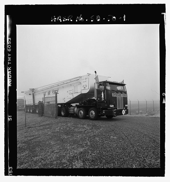 1. Missile transporter/erector, entering launch facility,...