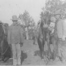 A photo of Jim Laffety Hodling Some William Browning Lafferty and With Son Joseph Cole Lafferty