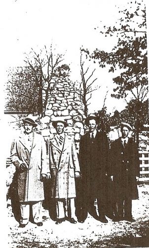 James C Anderson's Sons in front of his Pyramid grave
