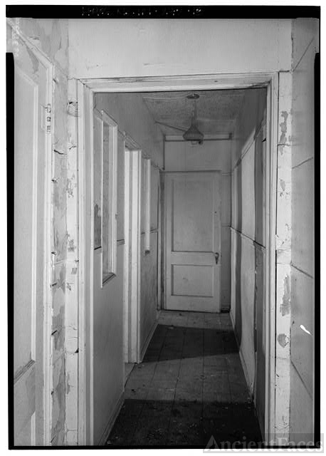 Side Hall 18. FIRST FLOOR, SIDE HALL TO GARAGE, INTERIOR WINDOWS...