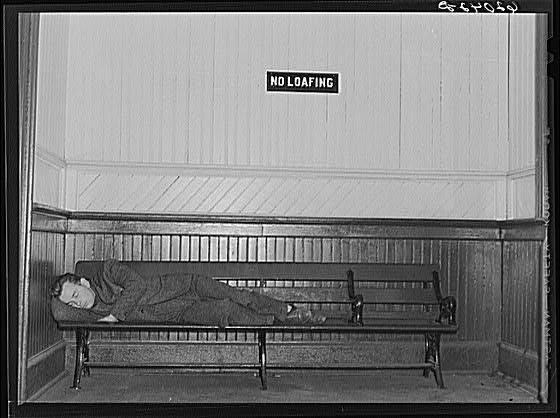 Boy from out of town sleeping in railroad station....