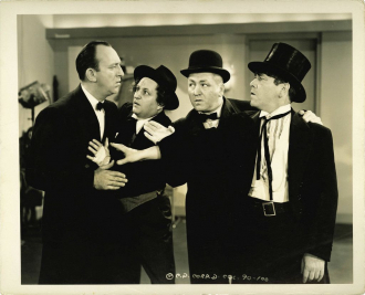 Allen Jenkins with the three stooges.