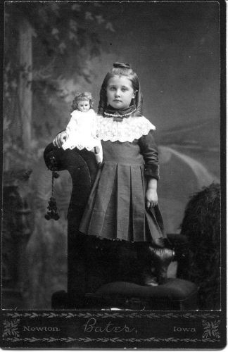 Little girl with doll