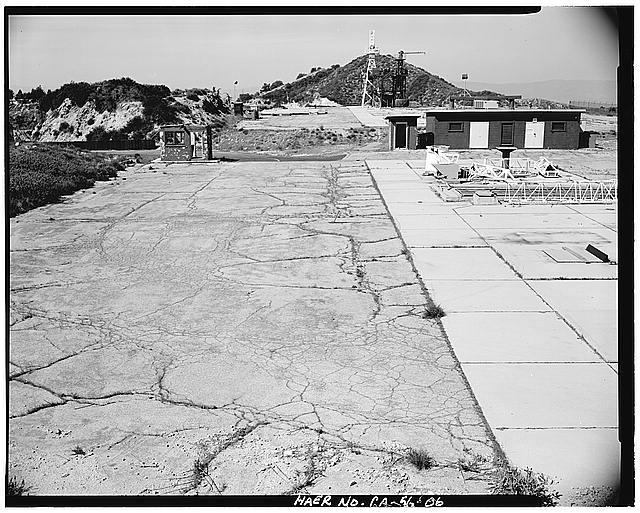 6. VIEW SHOWING GUARD HOUSE, STORAGE, AND TWO LAUNCH PAD...
