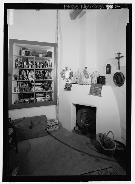 Detail view of fireplace in northwest corner of...