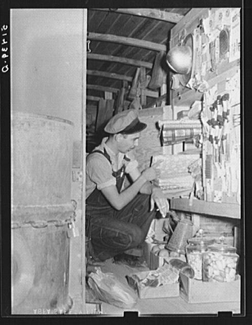 Inside of rolling store with tank of kerosene on back (at...