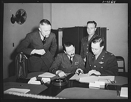 Combined Munitions Assignments Board. Staff members of...
