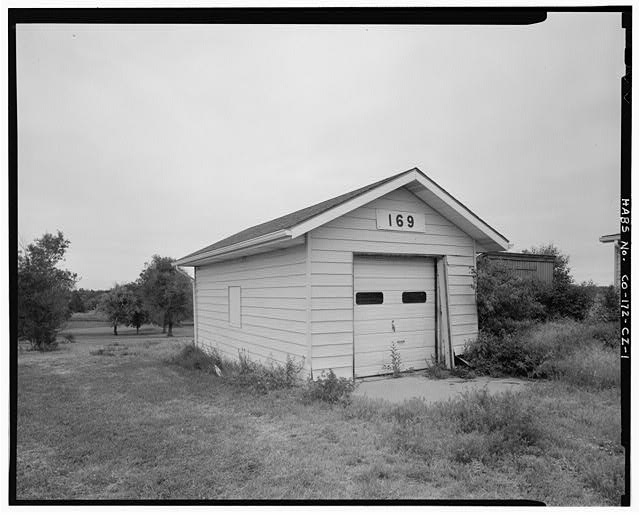 Front (south side) and west side of building. -...