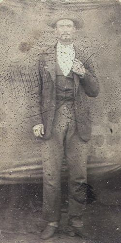 Tintype photo of man in hat