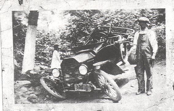 Man with wrecked car