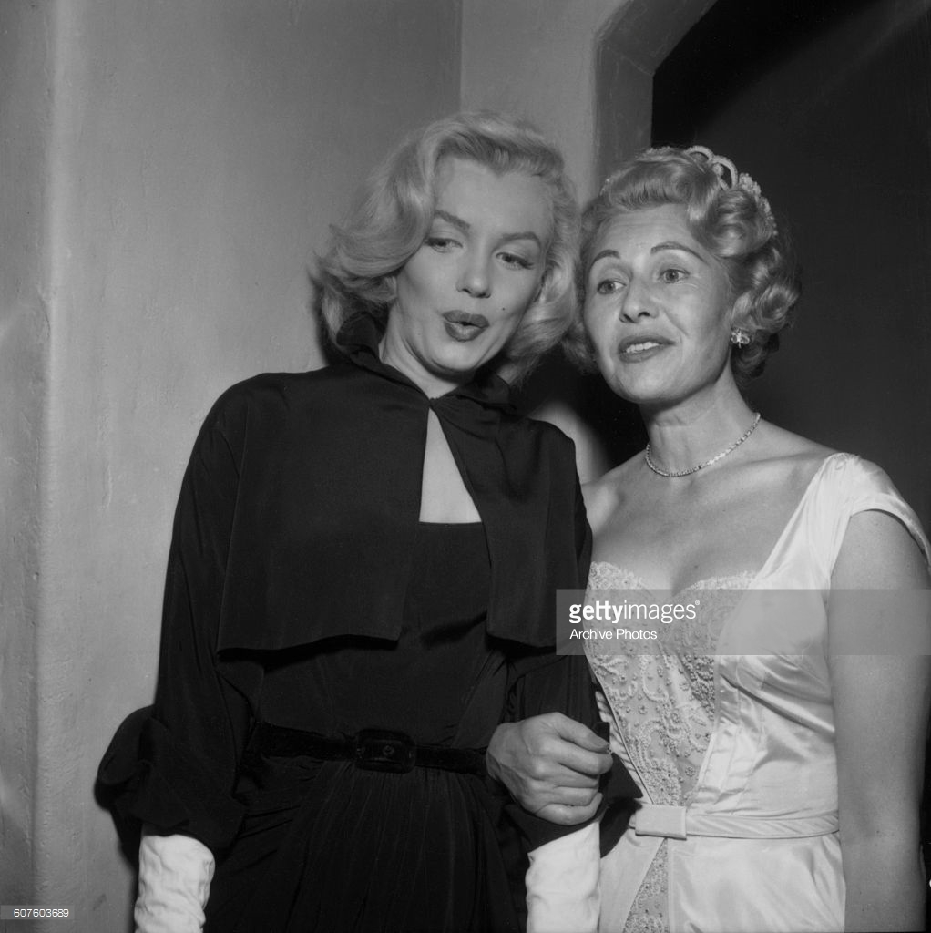 Sheilah Graham and Marilyn Monroe