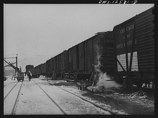 Chicago, Illinois. Cars on the repair track at a yard of...