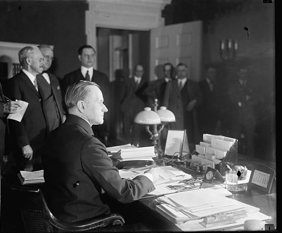 Coolidge signing tax bill, [2/26/26]