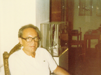 Milan Stoeger in his apartment, with art objects