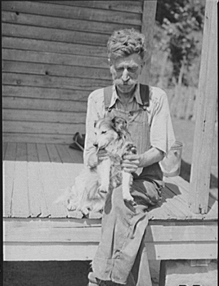 Kentucky Mountaineer with his dog 1940