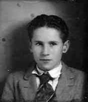 My Dad, Marc William Johnson b. 5-21-1912  d. 2000  Young man, I'd guess 12 to 14 by the looks of his face, shirt, and tie.