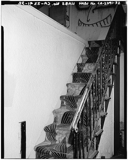 32. February. STAIRWAY INSIDE FORMER CAFE AREA, WITH...