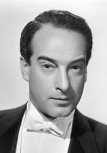 Victor Borge nearly always dressed formerly in a tuxedo.