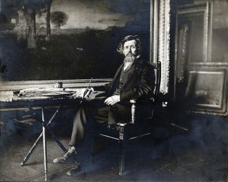 George Inness in studio