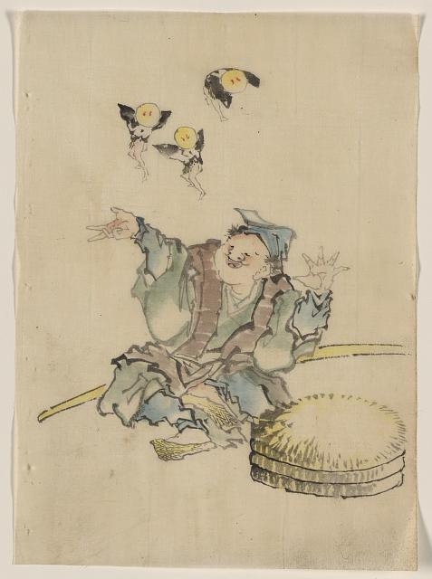 [A man, sitting on the ground, is wearing several layers...