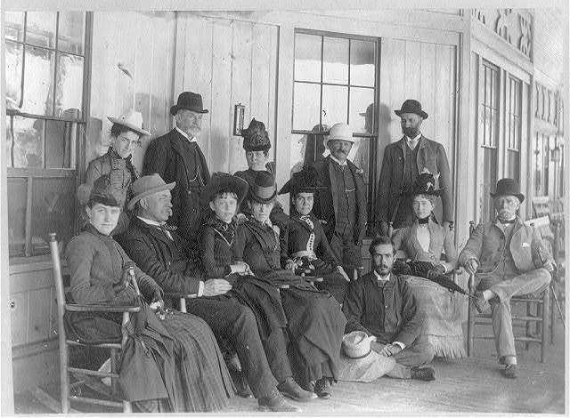 Group taken on porch of San Carlos Hotel, St. James