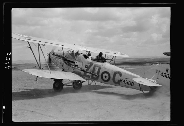 R.A.F. activities. Plane about to take off causing a...