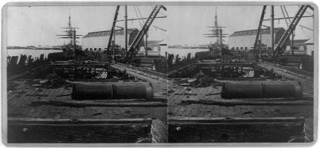 [Deck of U.S.S. Nipsk in foreground, Navy Yard,...