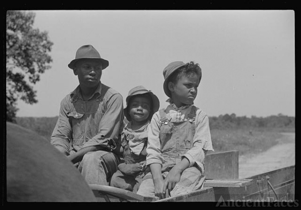 Project family in new wagon, Flint River Farms, Georgia