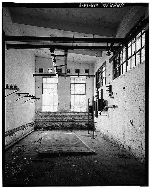 9. VIEW OF TRANSFORMER ROOM, SHOWING METAL SLIDING DOOR...