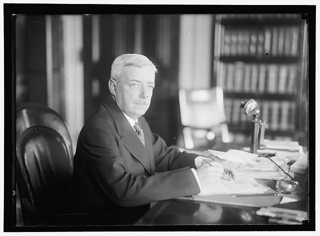 LANSING, ROBERT. SECRETARY OF STATE, 1915-1920. AT DESK