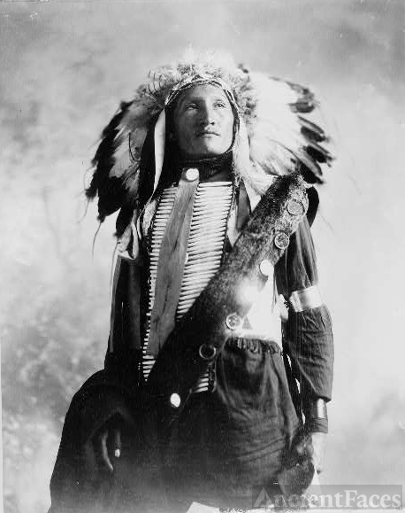 Sioux Indian in feather headdress