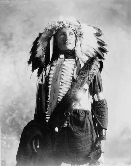 Sioux Indian in feather headdress
